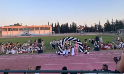 Καλοκαιρινός Παιδότοπος με παιδιά σε γήπεδο στίβου